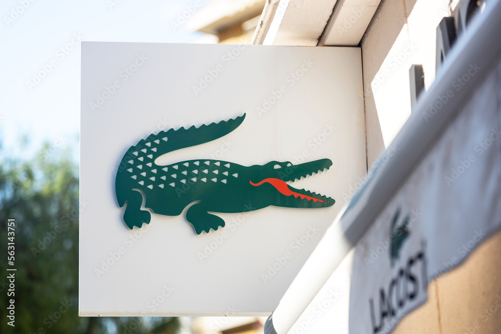 nice, alpes maritimes, france - 22 08 2022: a sign of a lacoste store Stock  Photo | Adobe Stock