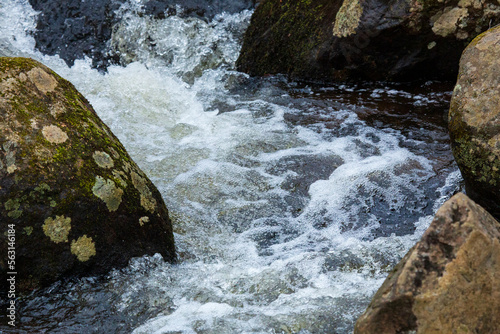 Rushing water at Temple Brook Conservation Area in Monson, Massachusetts. photo