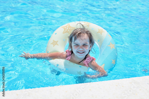 happy baby in the water, a beautiful sunny day and incredible baby emotions.