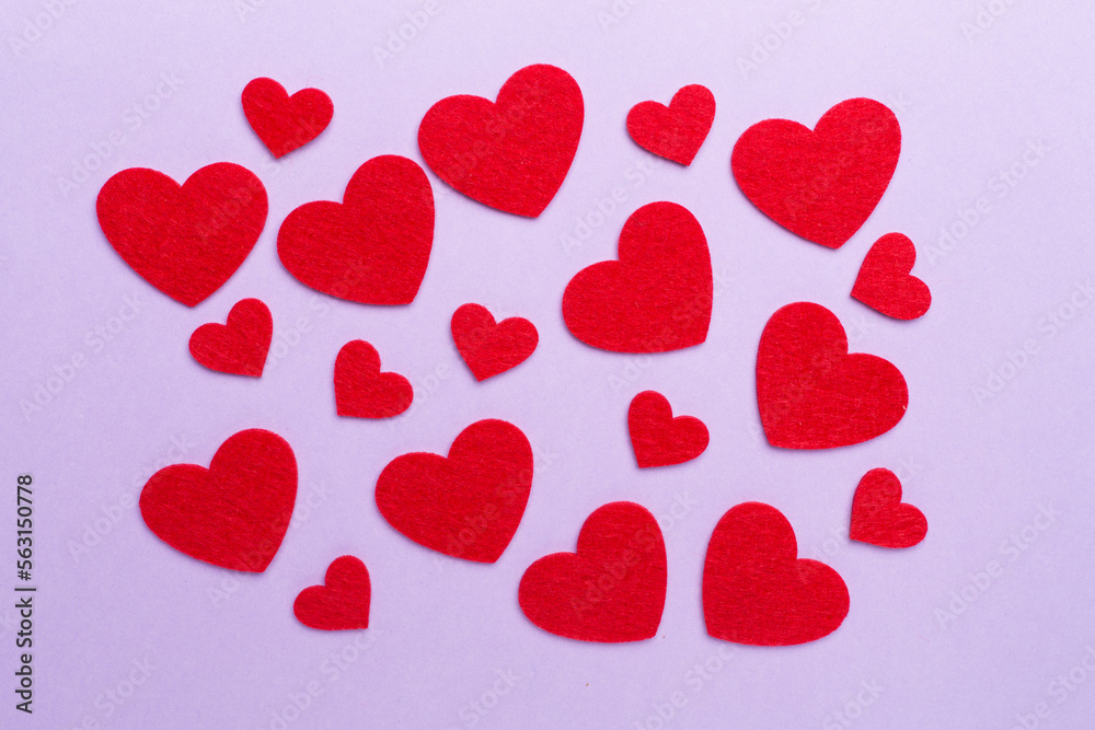 Felt hearts on color background, top view Felt hearts on color background, top view