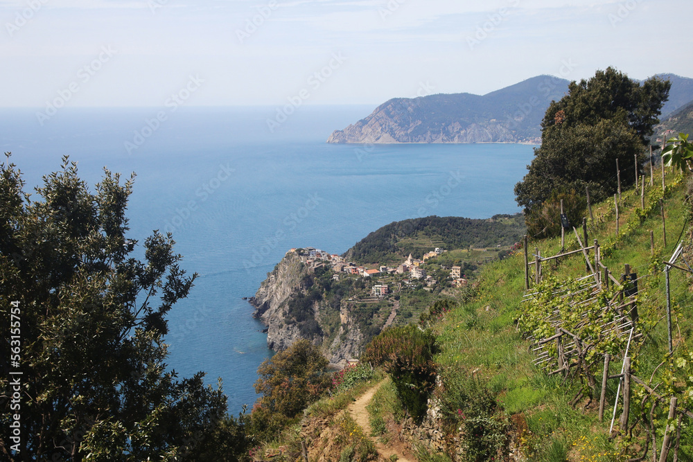 The panorama of CInque Terre national park and Corniglia village, Italy The panorama of CInque Terre national park and Corniglia village, Italy
