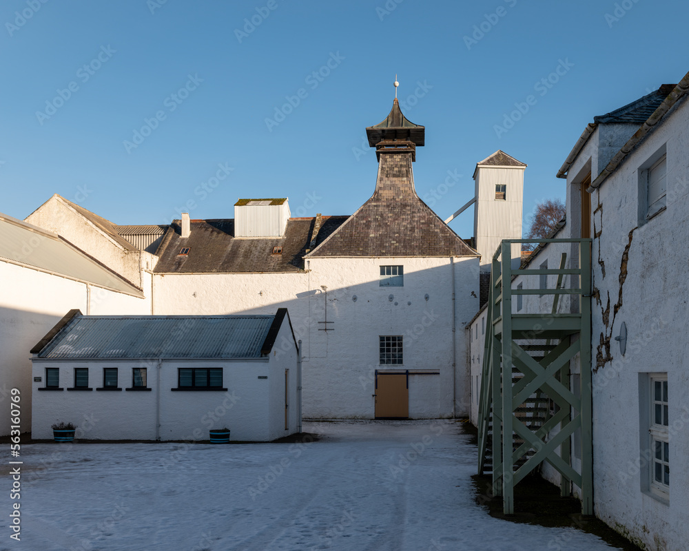 20 January 2023. Forres,Moray,Scotland. This is the Dallas Dhu Distillery near Forres following a snow fall on a bright sunny day with blue sky.