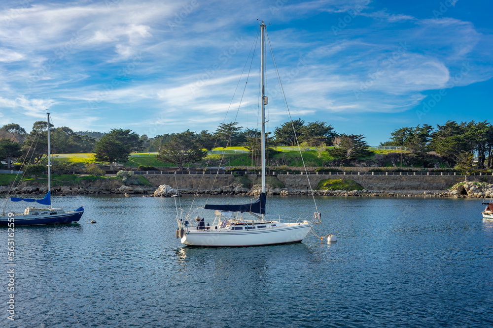 A Docked sailboat in Monterey harbor in California A Docked sailboat in Monterey harbor in California