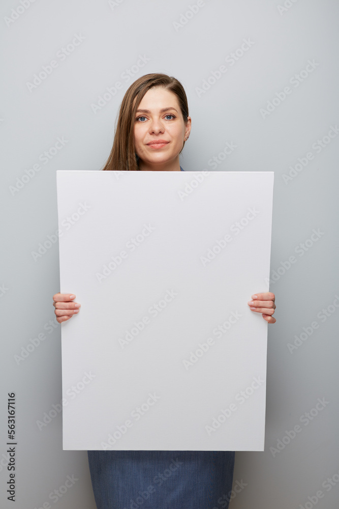 Smiling woman holding big empty banner. Smiling woman holding big empty banner.