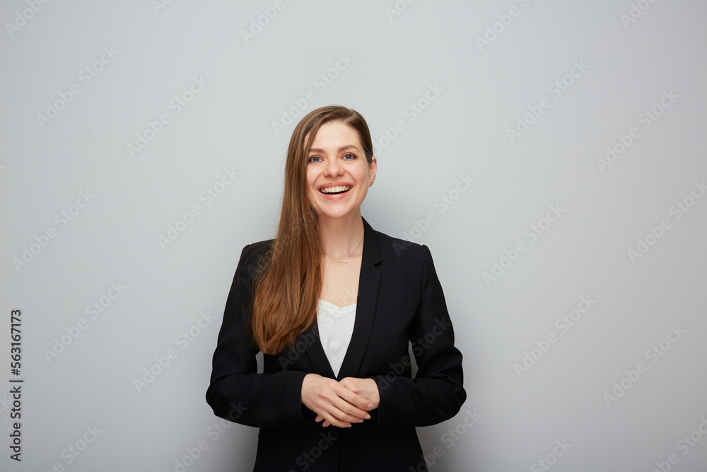 Young happy business woman in black suit Isolated portrait. Young happy business woman in black suit Isolated portrait.