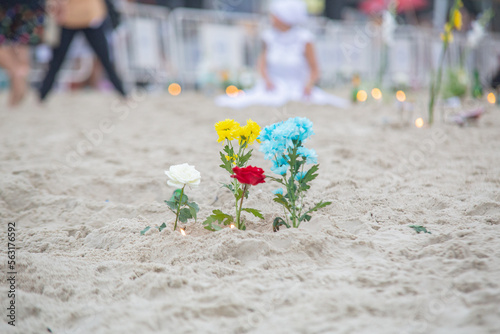 flowers in honor of iemanja, during a party at copacabana beach in Brazil. photo