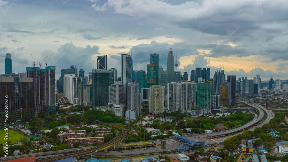 4K aerial hyperlapse of Kuala Lumpur cityscape during sunset with light trails traffic. Kuala Lumpur City Centre 4K aerial hyperlapse of Kuala Lumpur cityscape during sunset with light trails traffic. Kuala Lumpur City Centre