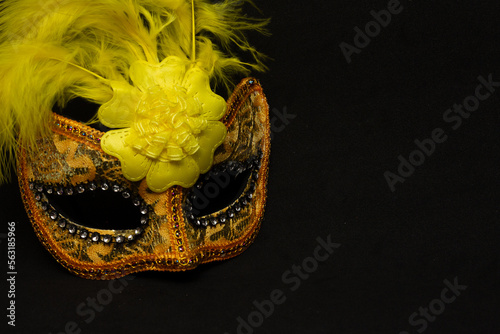 colorful carnival mask on a black background