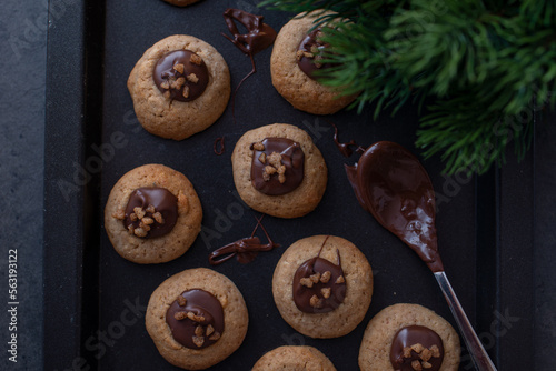 sweet home made chocolate christmas cookies on a christmas table