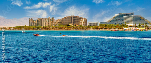 Panorama. Morning on the central public beach in Eilat - famous tourist resort and recreational city in Israel