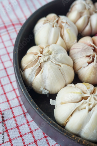 Garlic in Brown Bowl with close up view