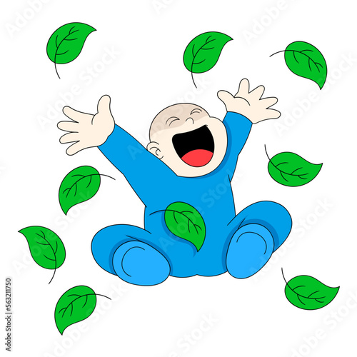 baby boy sitting welcoming spring playing plant leaves