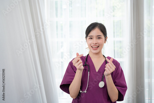 Portrait of asian young doctor using stethoscope in hospital.  © kelvn