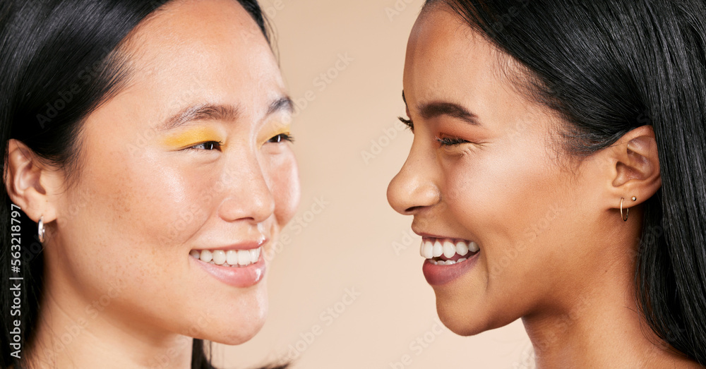 Face, makeup and diversity with model woman friends closeup in studio on a beige background. Skincare, beauty or cosmetics with an attractive young female and friend posing to promote a skin product Face, makeup and diversity with model woman friends closeup in studio on a beige background. Skincare, beauty or cosmetics with an attractive young female and friend posing to promote a skin product