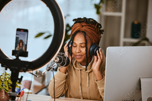 Communication, phone and influencer streaming podcast, radio talk show or speaker talking about teen culture. Presenter, black woman or host speaking about student news on online broadcast microphone