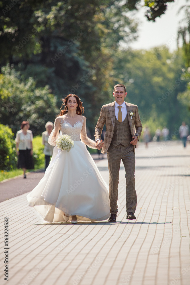 The bride and groom in a wedding dress. The bride and groom in a wedding dress.