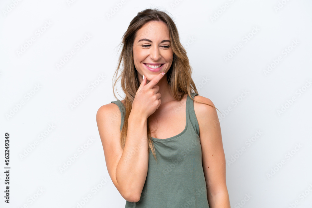 Young caucasian woman isolated on white background looking to the side and smiling Young caucasian woman isolated on white background looking to the side and smiling