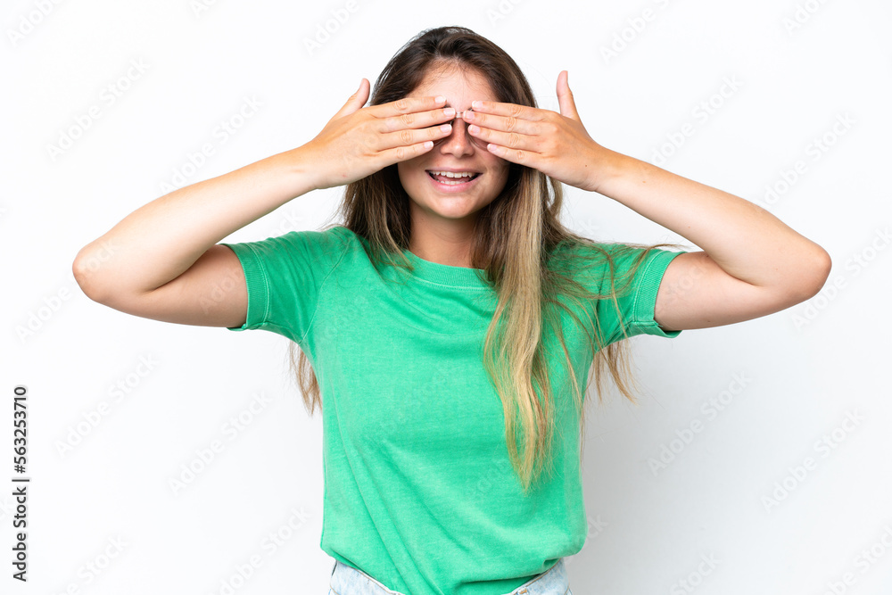 Young caucasian woman isolated on white background covering eyes by hands and smiling Young caucasian woman isolated on white background covering eyes by hands and smiling