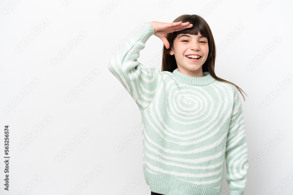 Little caucasian girl isolated on white background saluting with hand with happy expression Little caucasian girl isolated on white background saluting with hand with happy expression