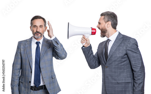 two businessmen ignore shouting loud in megaphone. businessmen ignore shouting in megaphone photo