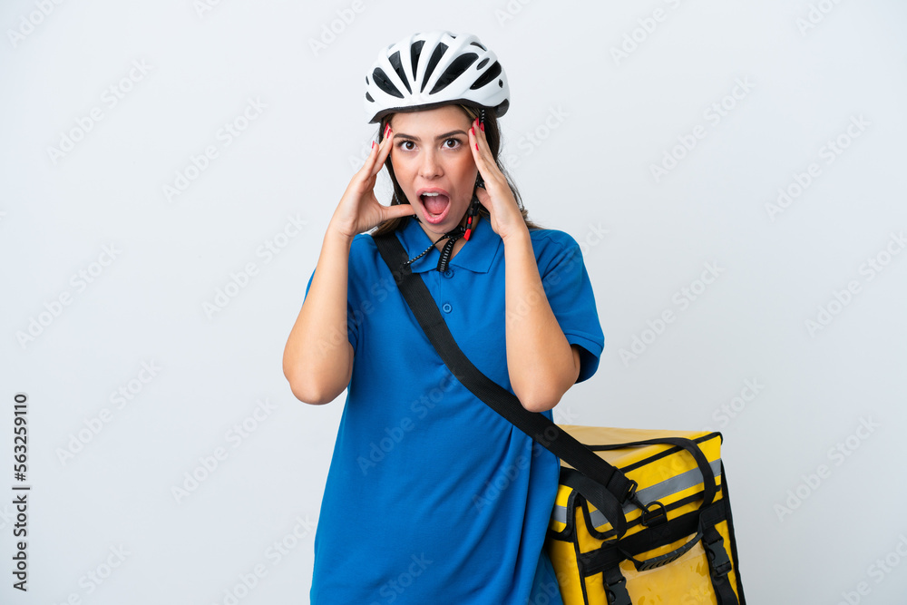Young delivery woman with thermal backpack isolated on white background with surprise expression Young delivery woman with thermal backpack isolated on white background with surprise expression