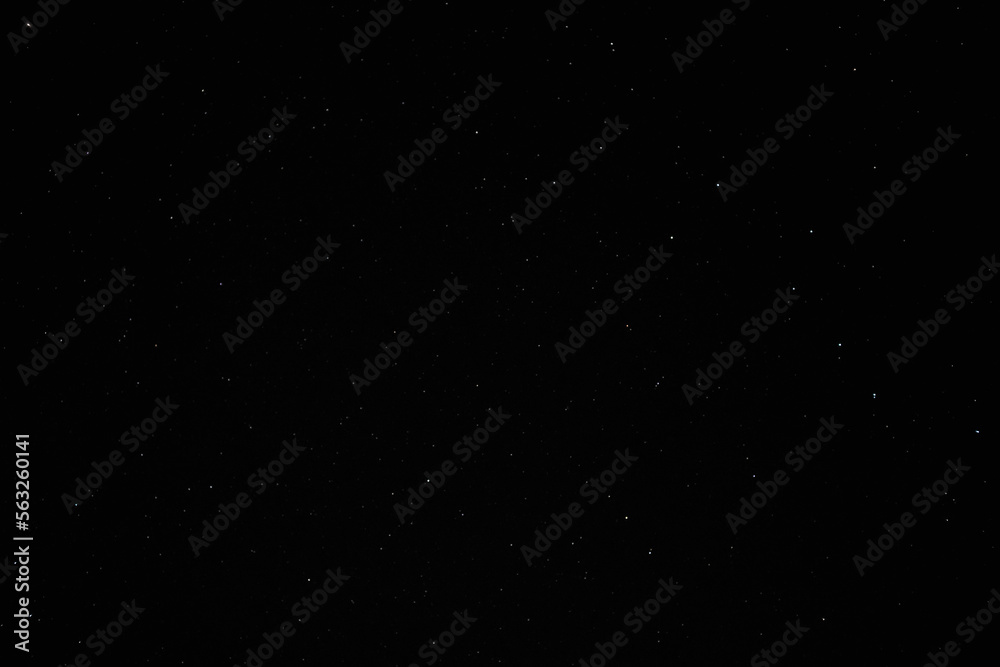 Dark night sky with stars background. Space stars texture. Colorful stars in the night sky