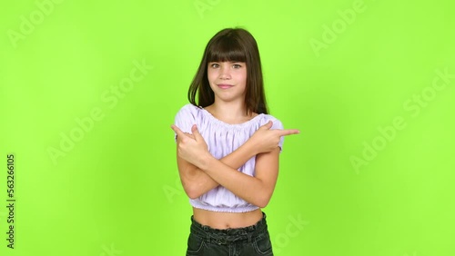 Little girl pointing to the laterals having doubts over isolated background