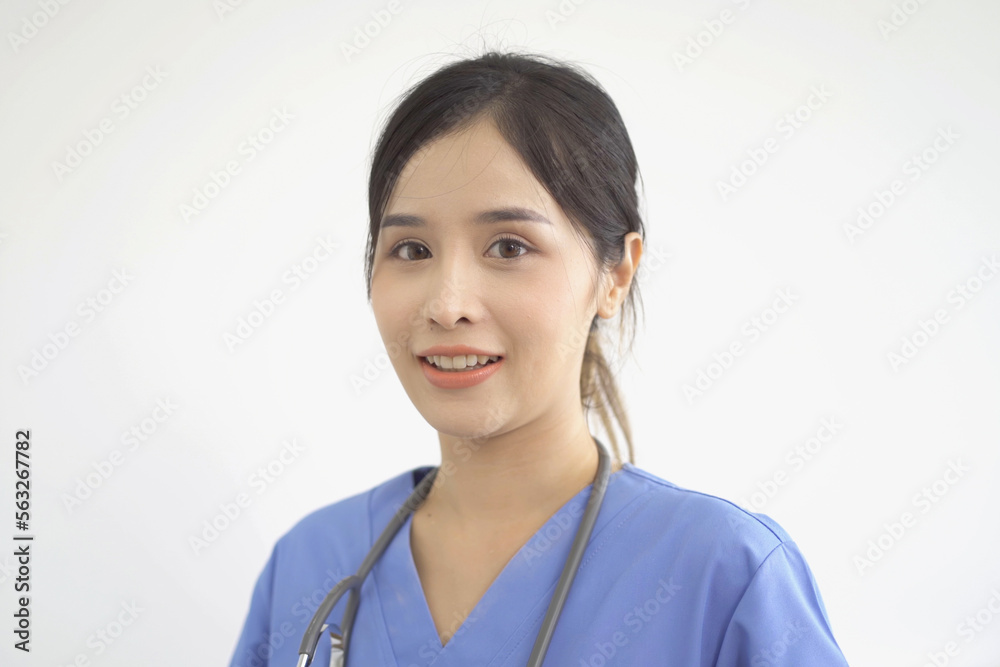 A portrait of Asian nurse woman smiling in hospital or clinic with medical gown cloth uniform in medical, healthcare. People lifestyle.