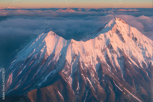 aerial landscape photo shot of a mountain from above, mist and snow - AI Generated