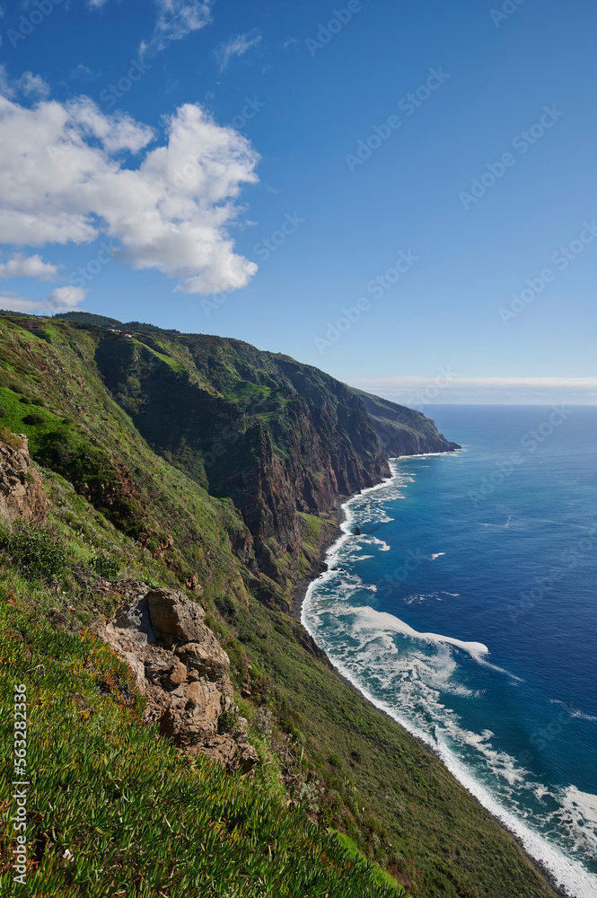 Cliffs, Atlantic Occean and blue sky on sunny day, Madeira, Portugal Cliffs, Atlantic Occean and blue sky on sunny day, Madeira, Portugal