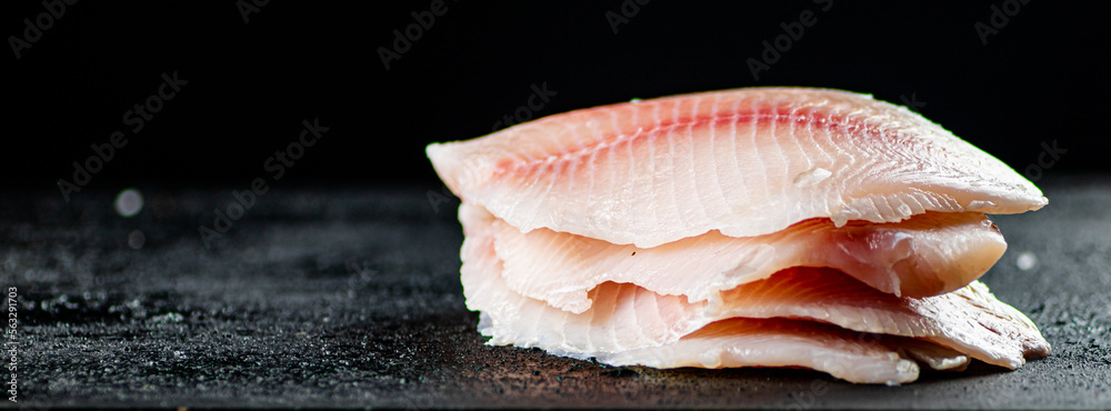 Uncooked fish fillet on the table. Uncooked fish fillet on the table.