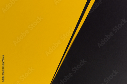 Yellow and black background divided diagonally