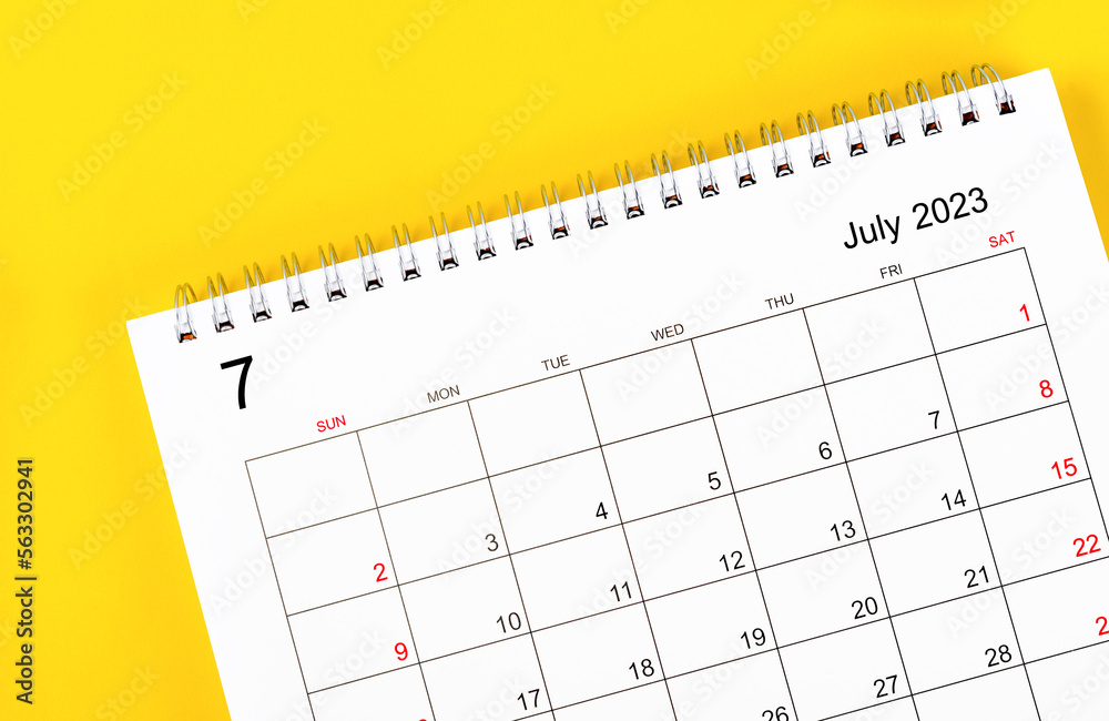 The July 2023 Monthly desk calendar for 2023 year on yellow background. The July 2023 Monthly desk calendar for 2023 year on yellow background.
