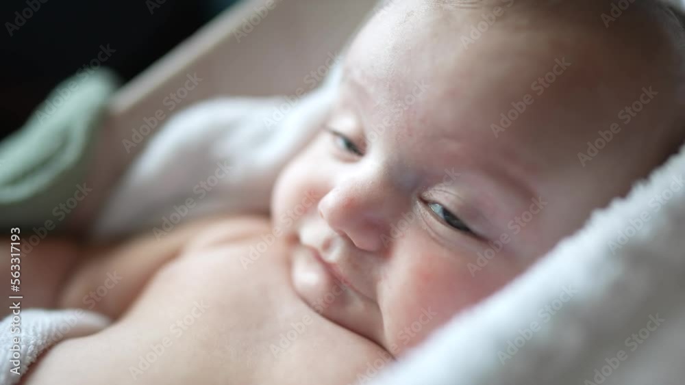 newborn baby swinging in a rocking chair. happy family kid dream
