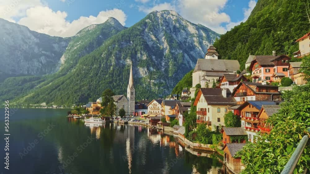 Morning shot of Hallstatt - beauty of Alps, Austria. Picturesque lakeside houses and mountains. One of the most picturesque villages in Austria - Hallstatt Morning shot of Hallstatt - beauty of Alps, Austria. Picturesque lakeside houses and mountains. One of the most picturesque villages in Austria - Hallstatt