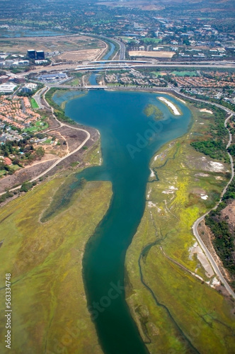 california wetlands around san diego creek orange county newport and irvine with state route 73 corona del mar freeway and jamboree road in the background