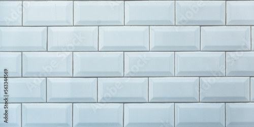 New clean white wall brick made from plastic PVC is shiny glossy in light