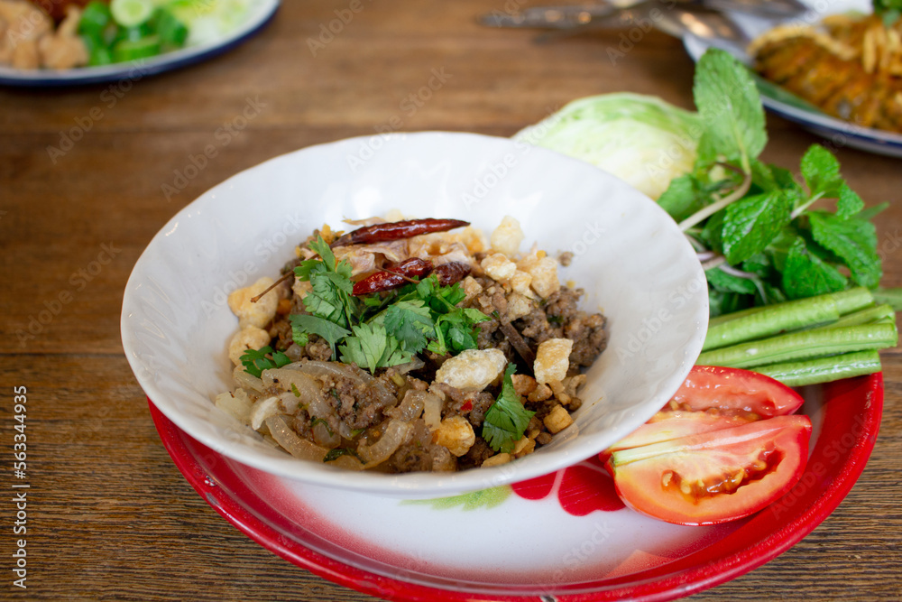 Spicy minced pork salad, Larb Moo, famous traditional Thai food of Northern Thailand. Spicy minced pork salad, Larb Moo, famous traditional Thai food of Northern Thailand.