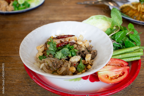 Spicy minced pork salad, Larb Moo, famous traditional Thai food of Northern Thailand.