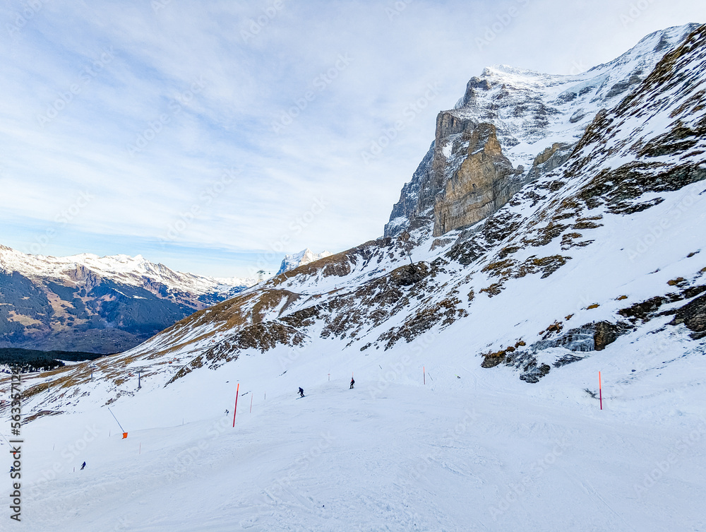 Ski slopes and mountains in Jungfrau ski resort in Swiss Alps, Grindelwald, Switzerland
