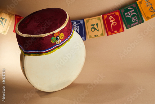 Happy Sonam Losar lunar New Year festival of Nepal. Traditional Tamang topi hat, hand drum and flags Om mani padme hum. photo