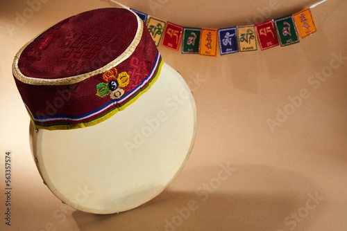 Happy Sonam Losar lunar New Year festival of Nepal. Traditional Tamang topi hat, hand drum and flags Om mani padme hum. photo