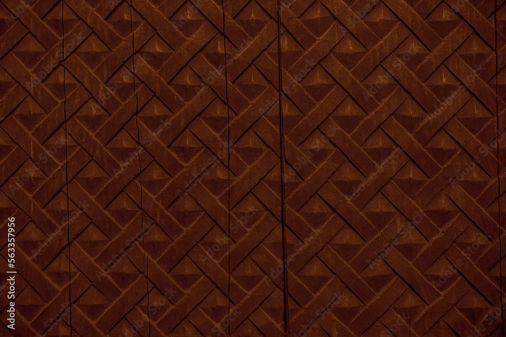 Square pattern on carved wood background seamless texture, panel. Carved geometric pattern on wooden background. Square pattern on carved wood background seamless texture, panel. Carved geometric pattern on wooden background.