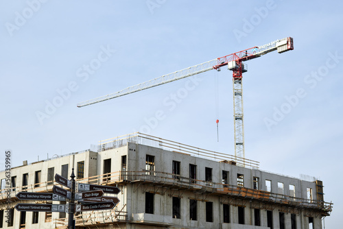 Low-angle view of a construction site with a tall crane seen working during the day in Budapest