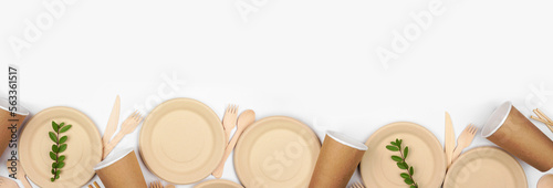 Eco friendly disposable dishware for takeout. Bottom border on a white background. Biodegradable, composable alternative to plastic. Top down view with copy space.