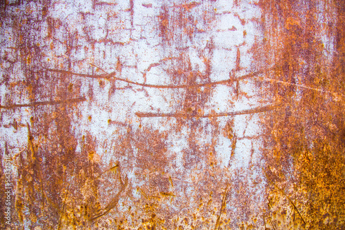 Old cracked paint in craquelure on a rusty metal surfaceGrunge rusted metal texture. Rusty corrosion and oxidized background. Worn metallic iron rusty metal background. © Павел Мещеряков