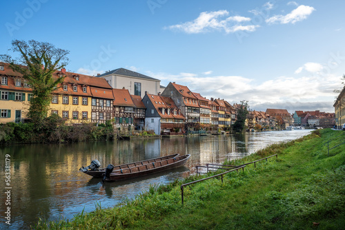 Regnitz River riverbank with small boats and old houses - Bamberg, Bavaria, Germany