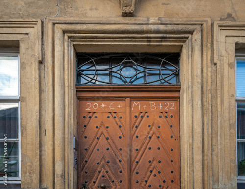 Photographie Old Door with chalk inscriptions for Chalking the Door Epiphany Traditional bles
