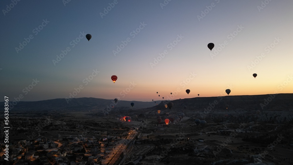 Incredible sunrise and balloons over the hills in Cappadocia. The view from the drone.