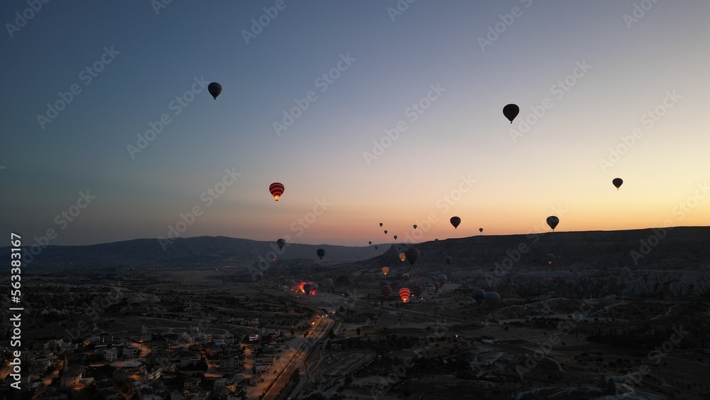 Incredible sunrise and balloons over the hills in Cappadocia. The view from the drone. Incredible sunrise and balloons over the hills in Cappadocia. The view from the drone.